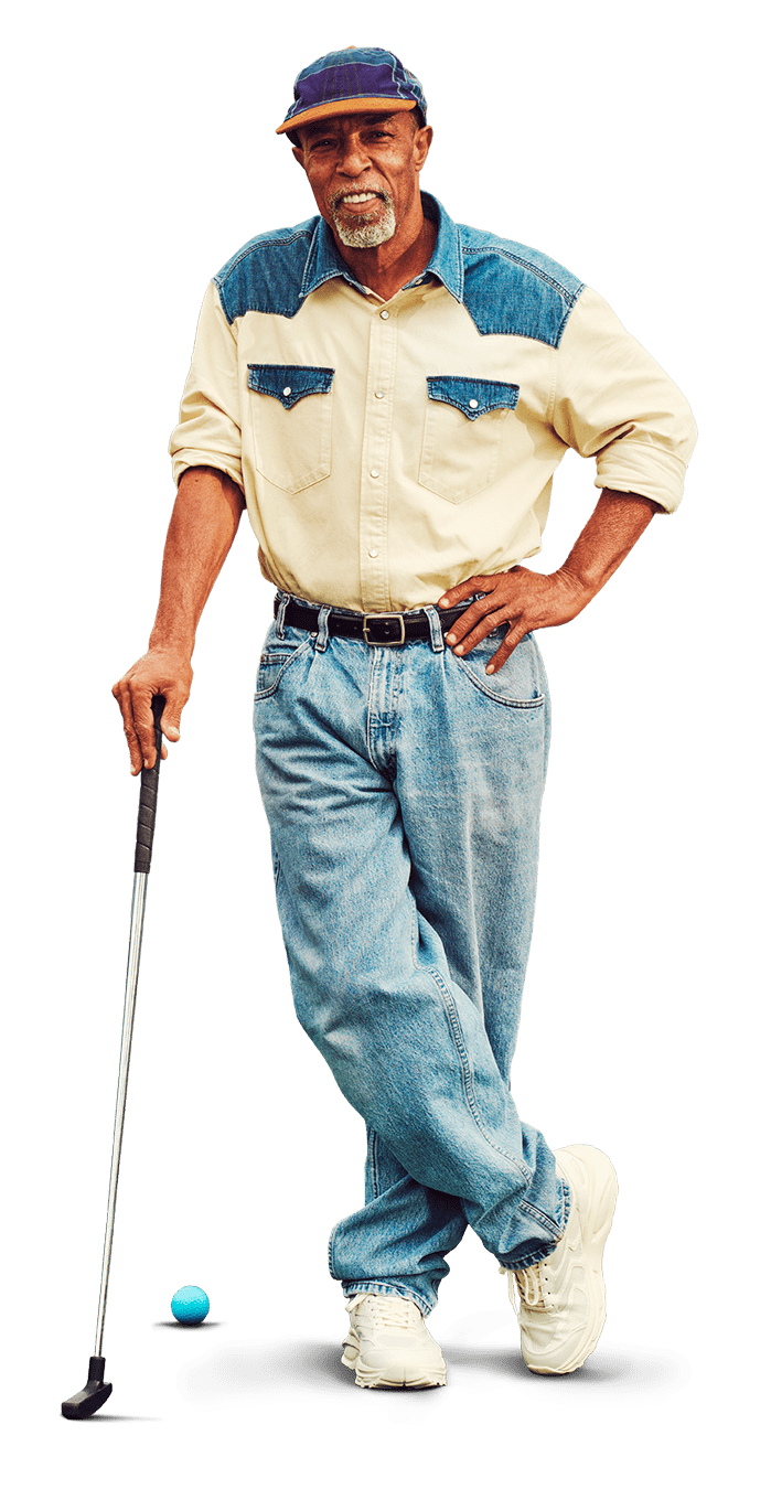 Man wearing denim hat and blue jeans holding a mini golf club
