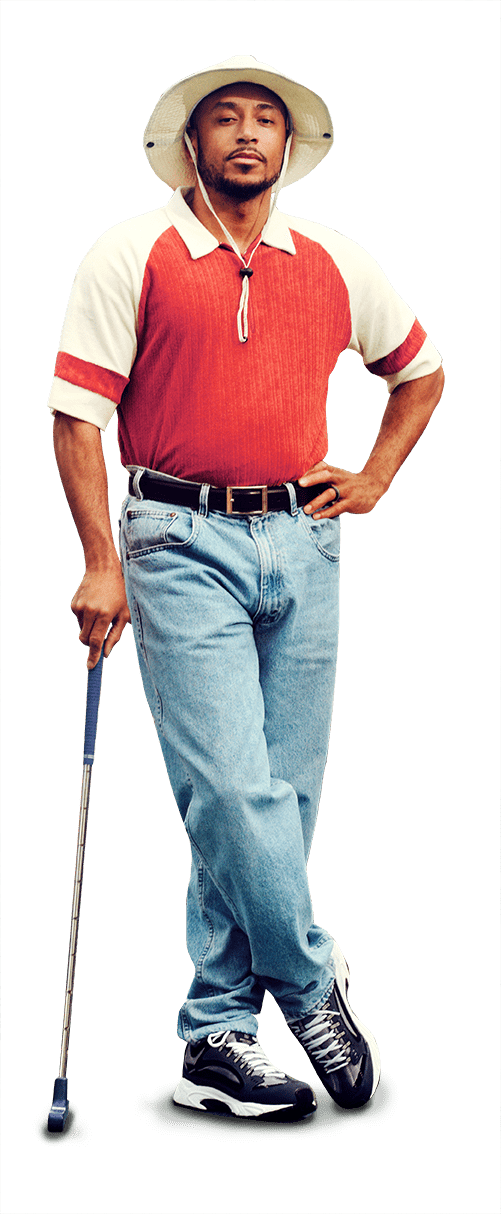 Man in blue jeans, orange shirt, and hat holding a mini golf club